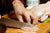 Cutting Chicken on table - Chicken Broth