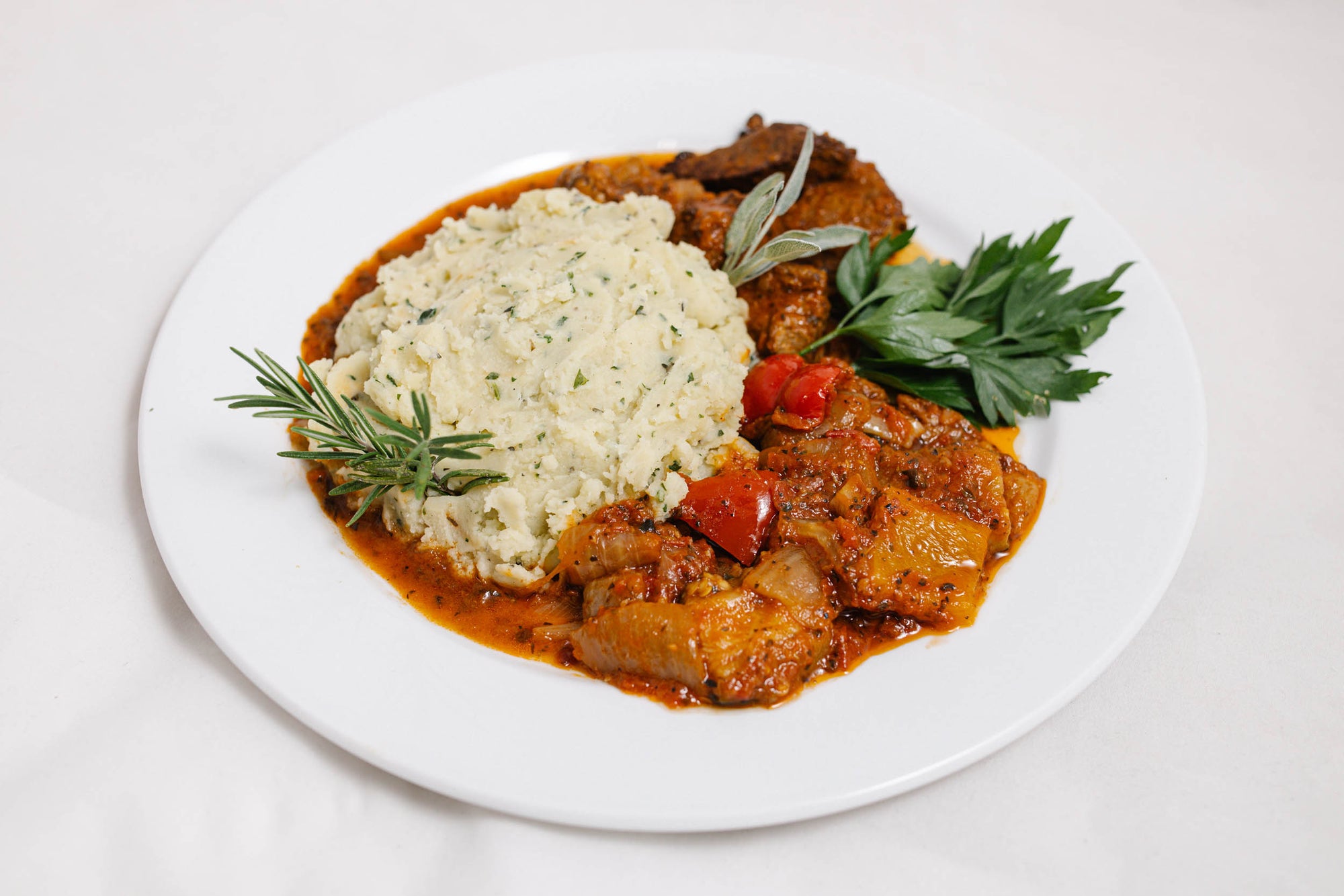 Mashed Potato - Herb/Garlic on a plate